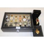 A box of assorted watches & other