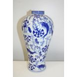 A large blue & white Oriental vase with marks to the base 33cm tall