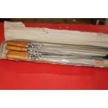 A set of wooden handled BBQ skewers