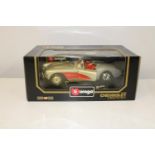 A boxed Burago model 1:18 scale