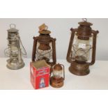 A selection of vintage tilly lamps etc