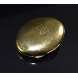 Goldene ovale Pillendose mit Monogramm "FL". 18 ct. GG, 37,5 g. L 5 cm