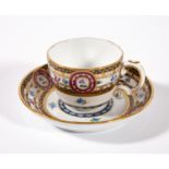 Moccatasse mit Untertasse. Polychrome Bemalung mit Blüten und Bandelwerk. Goldstaffage. Herend