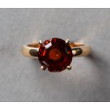 Citrinring. Runder facettierter Madeira-Citrin ca. 4,39 ct. Fassung 14 ct. Roségold