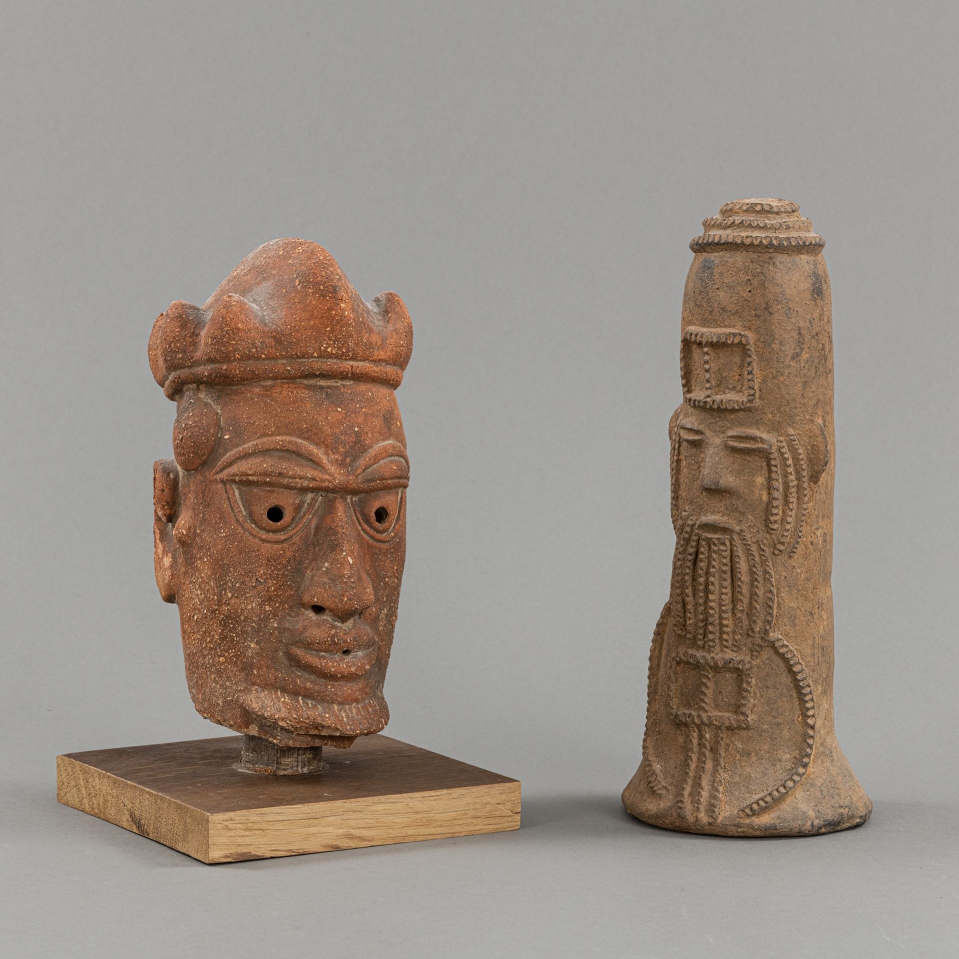 TWO TERRACOTTA FIGURES, ONE IN THE NOK -STYLE