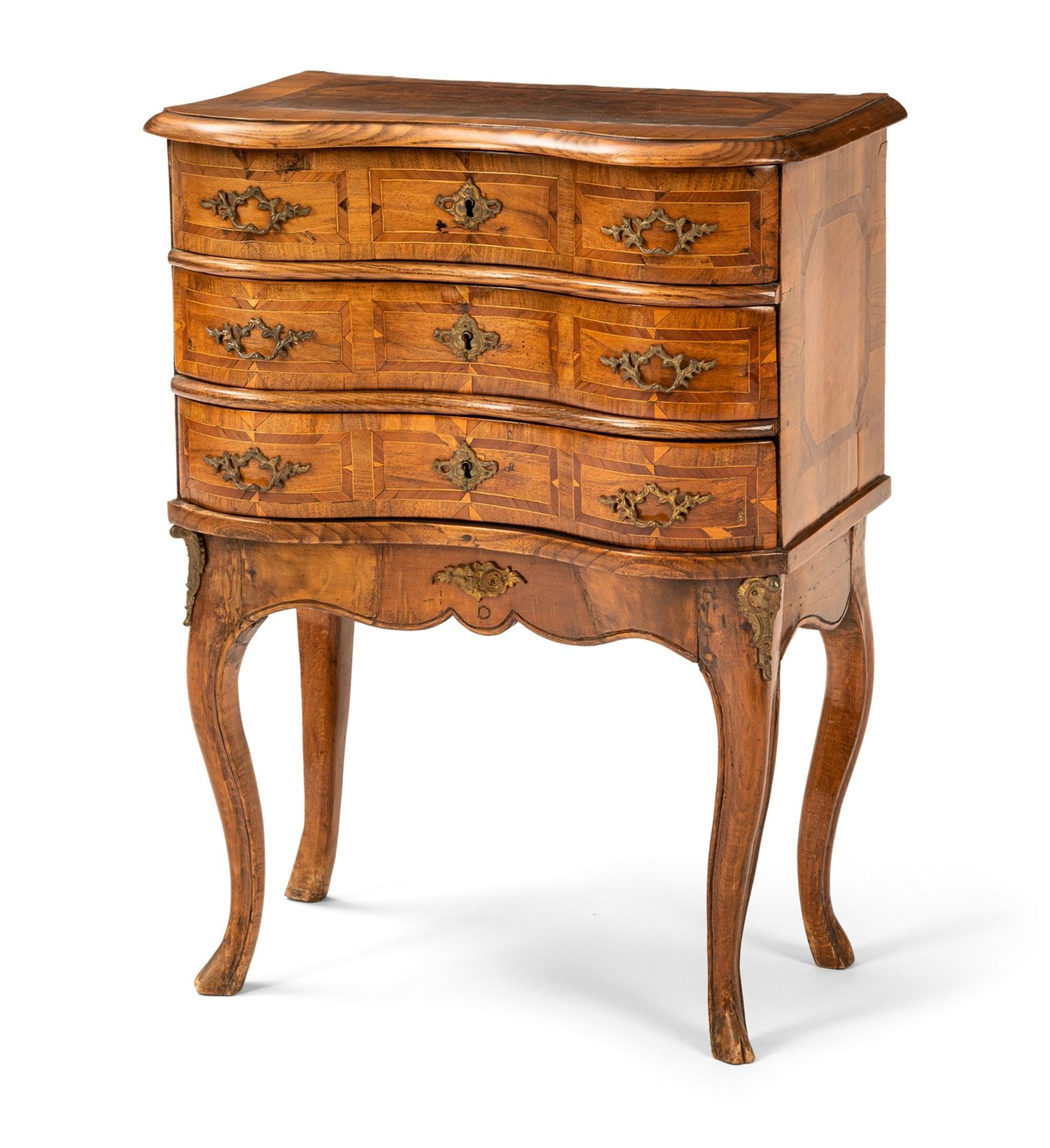 A BAROQUE MODEL COMMODE WITH LATER FEET