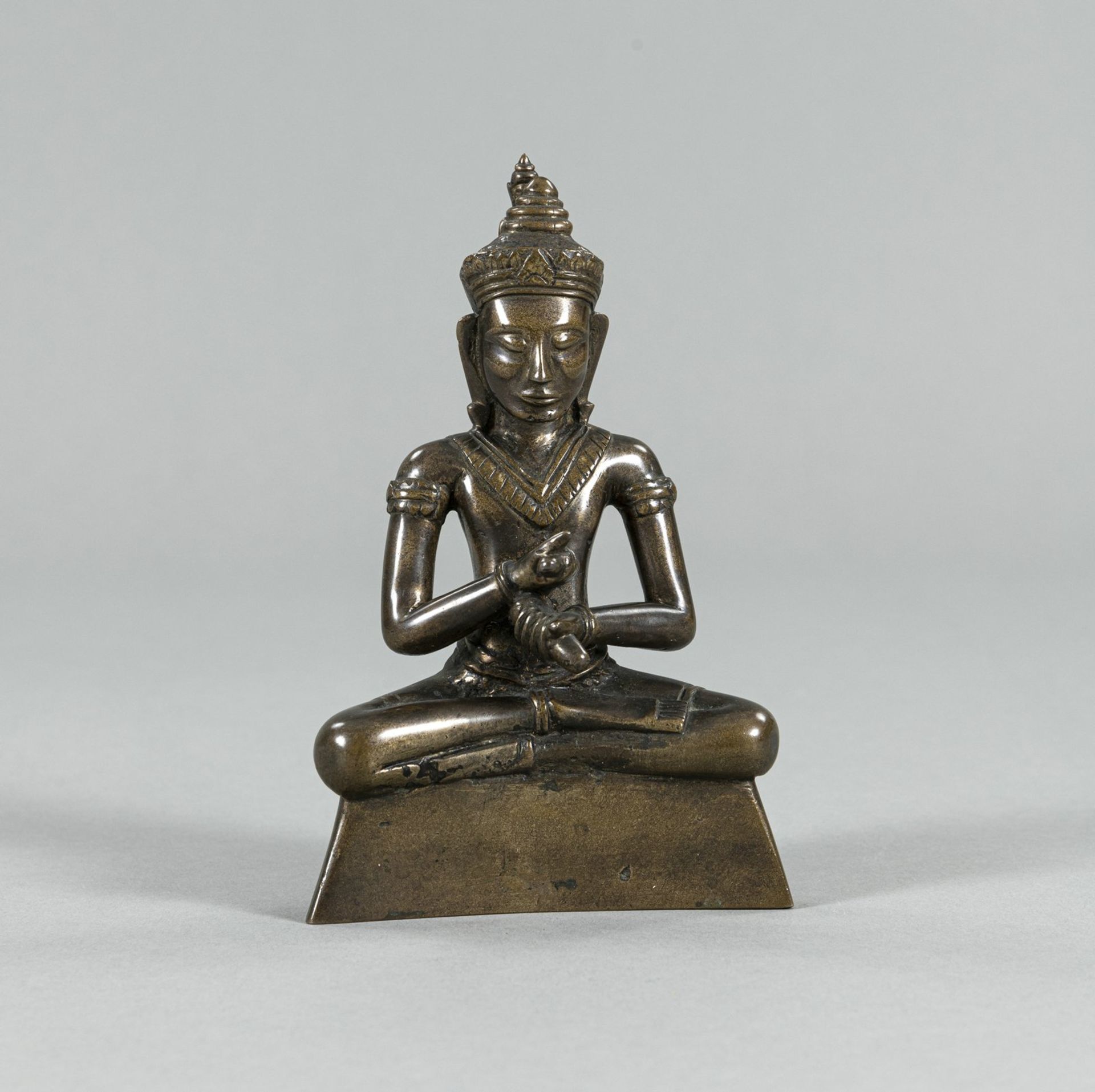 AN UNUSUAL BRONZE FIGURE OF BUDDHA