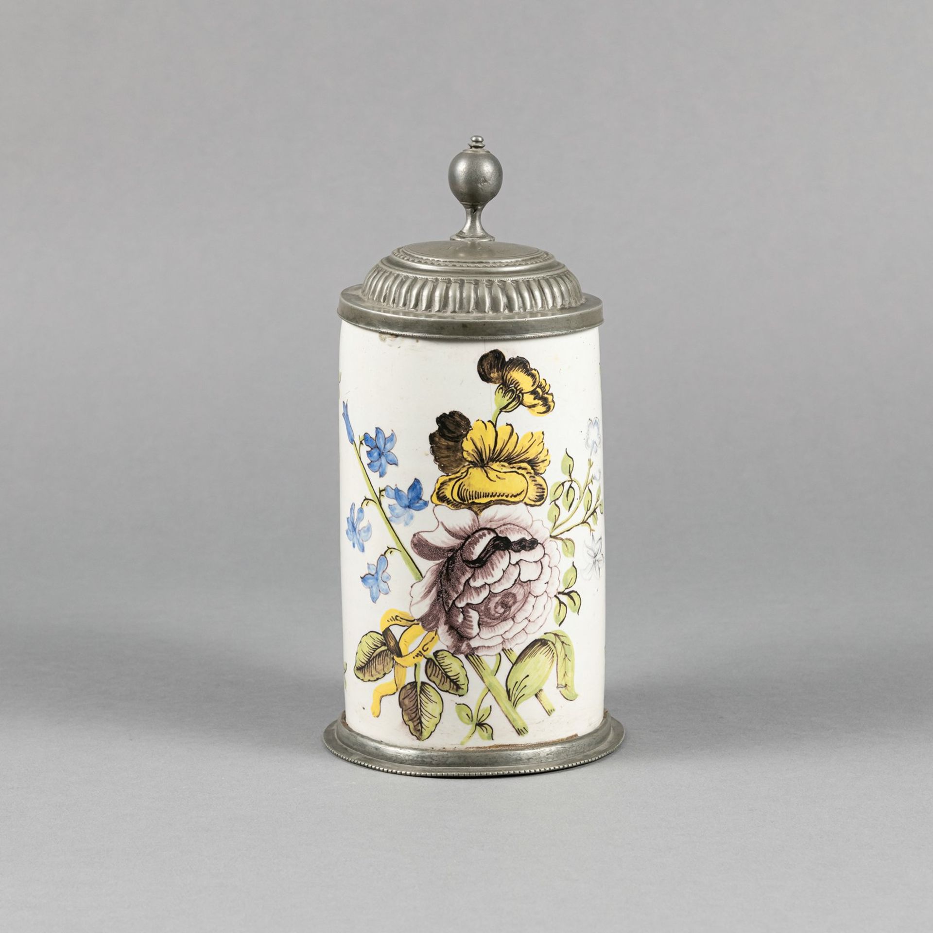 A PROBABLY FLOERSHEIM FAYENCE TANKARD