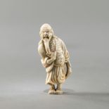 Netsuke eines Sennin aus Porzellan