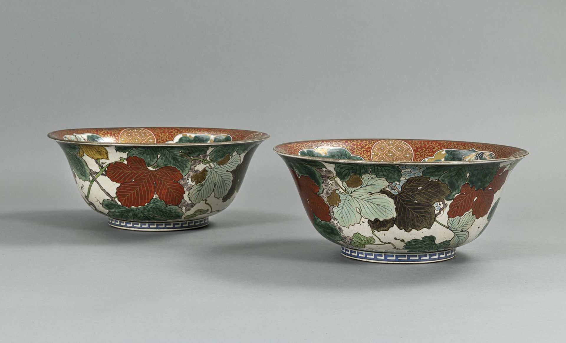 A PAIR OF LARGE PORCELAIN BOWLS WITH BIRDS AND FLORAL DECORATION