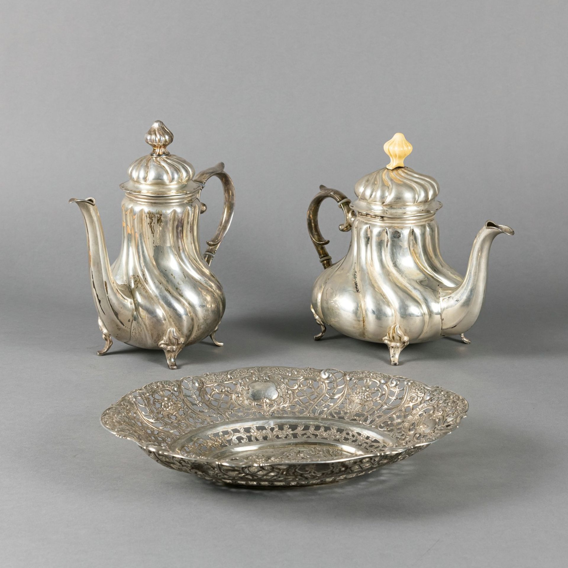 TWO COFFEE POTS AND A SILVER BASKET,