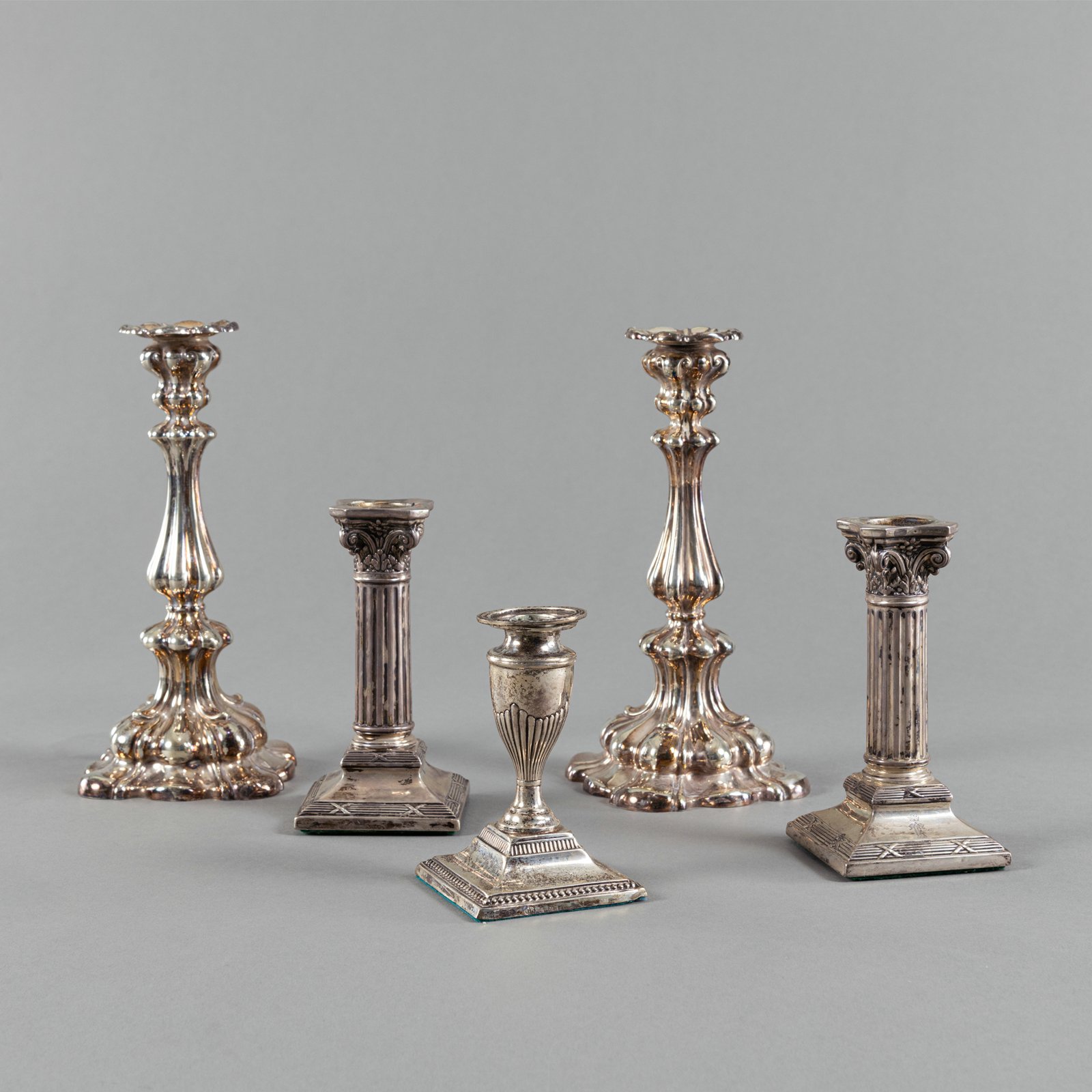 FIVE SILVER CANDLESTICKS