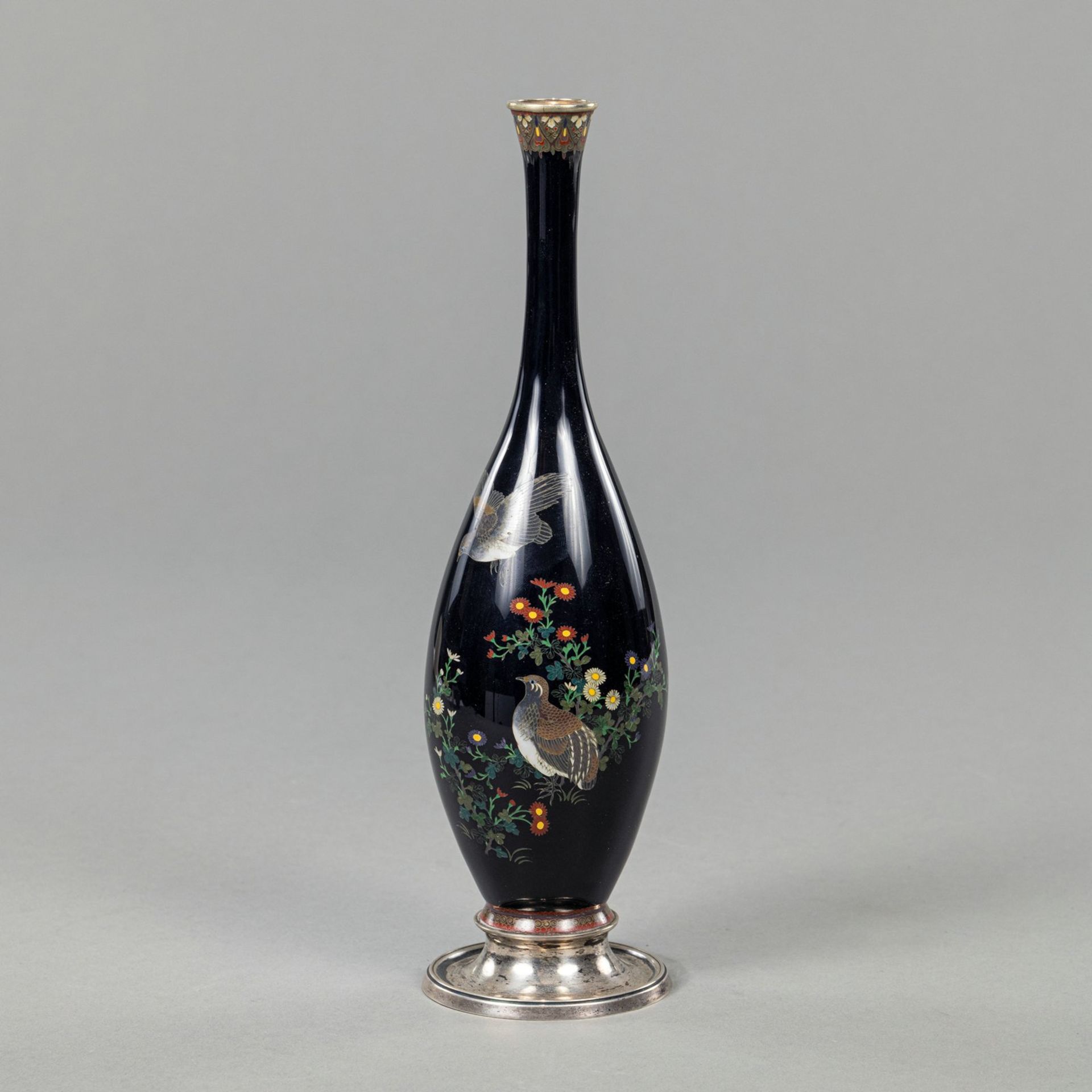 A CLOISONNÉ ENAMEL VASE DECORATED WITH A PAIR OF QUAILS ON DARK BLUE GROUND