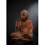 Buddha Shakyamuni aus Holz mit Lackauflage und Vergoldung