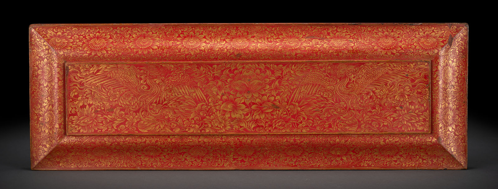 A FINE PAIR OF RED-LACQUERED WOODEN BOOK COVERS WITH FINE GILT PAINTING