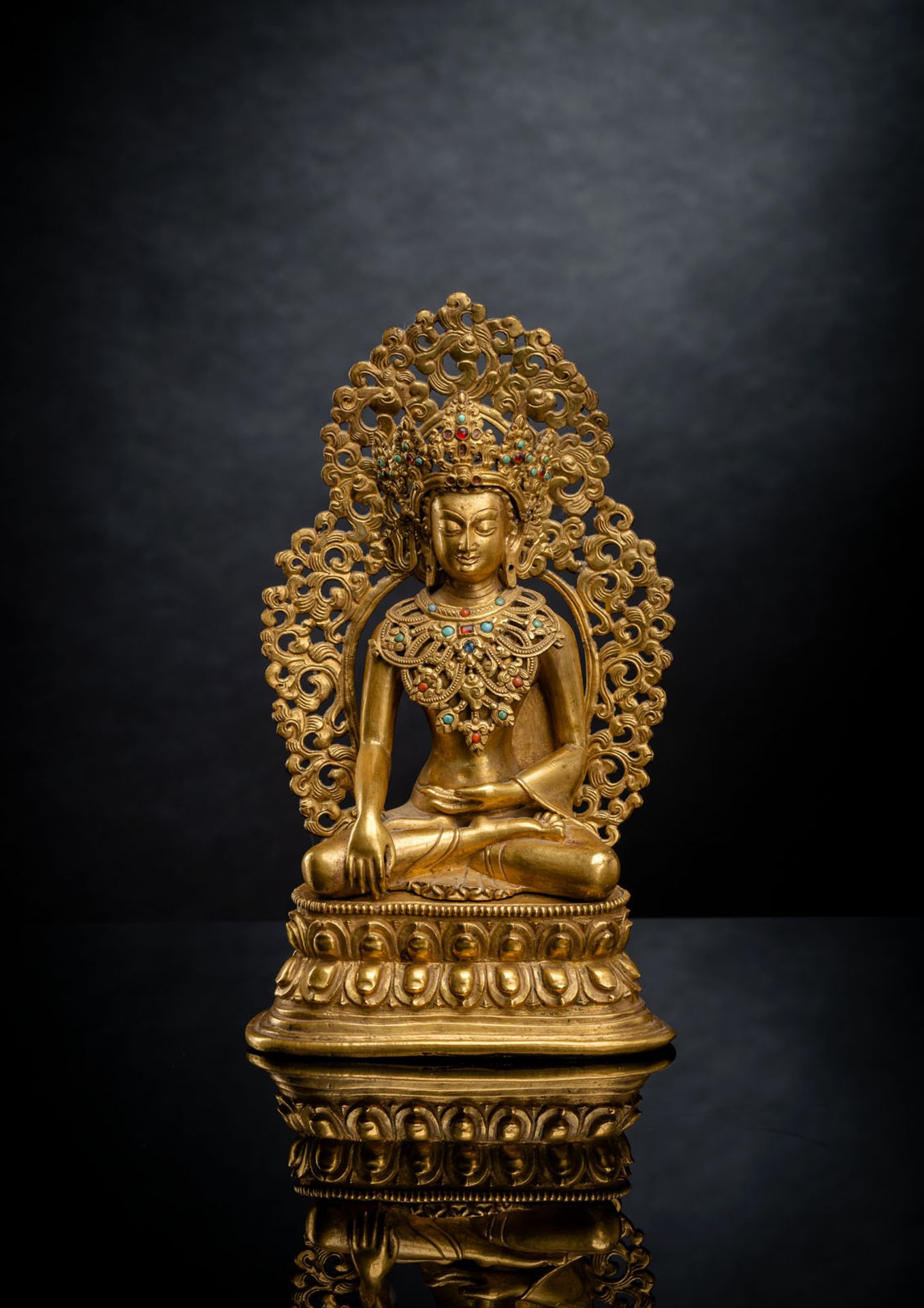 A FINE GILT-BRONZE FIGURE OF BUDDHA SHAKYAMUNI