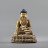 Tsa-tsa mit Lama-Darstellungen und ein kleiner Buddha Shakyamuni