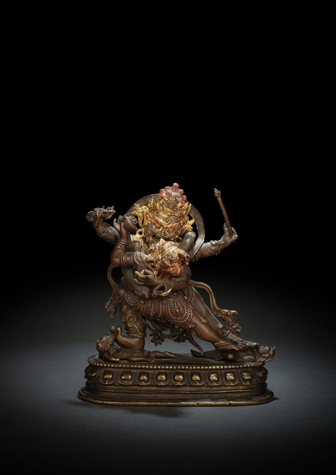 A RARE BRONZE EMANATION OF VAJRAPANI ON A LOTUS