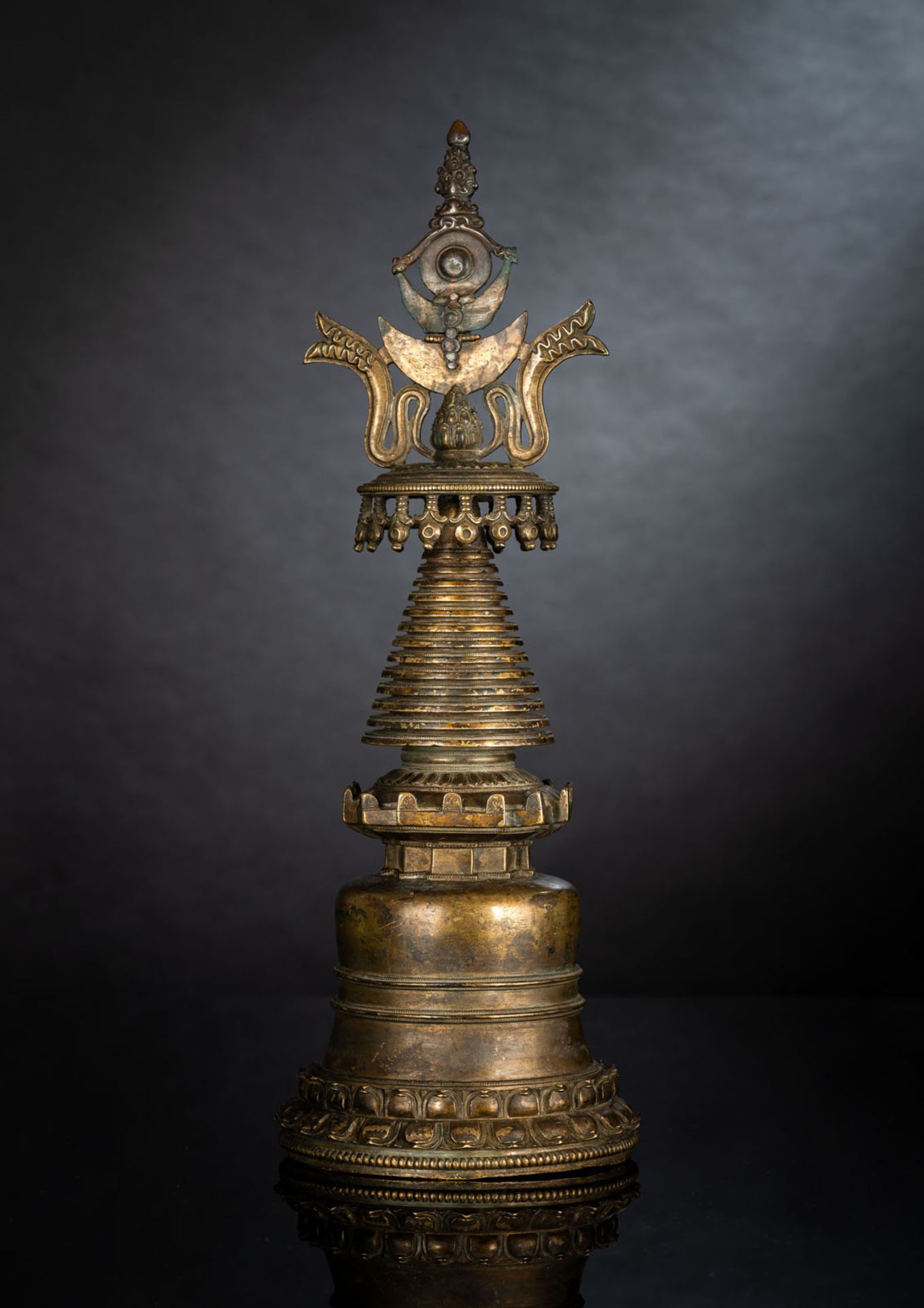 A RARE LARGE BRONZE STUPA