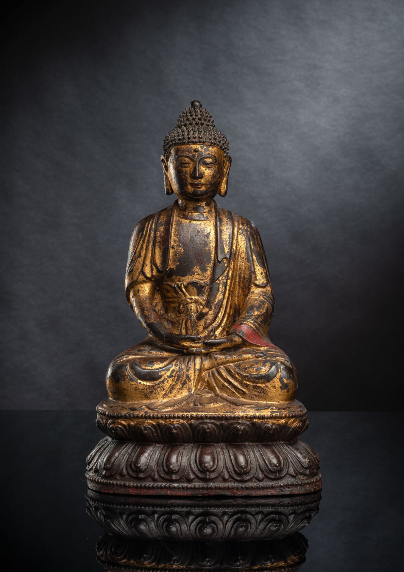 A LARGE PART-GILT BRONZE FIGURE OF SEATED BUDDHA SHAKYAMUNI