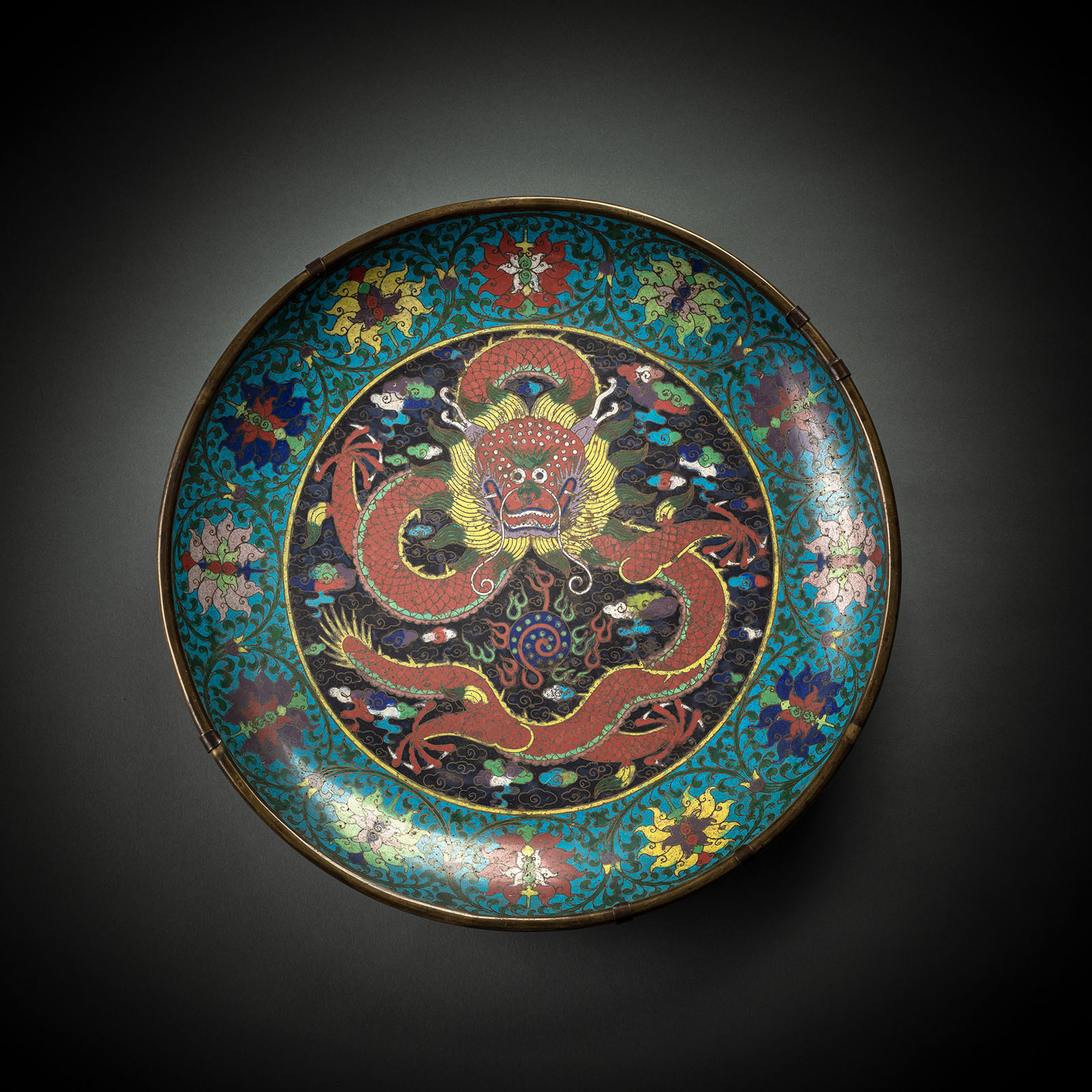 A TURQUOISE-GROUND CLOISONNÉ DRAGON AND LOTUS PLATE