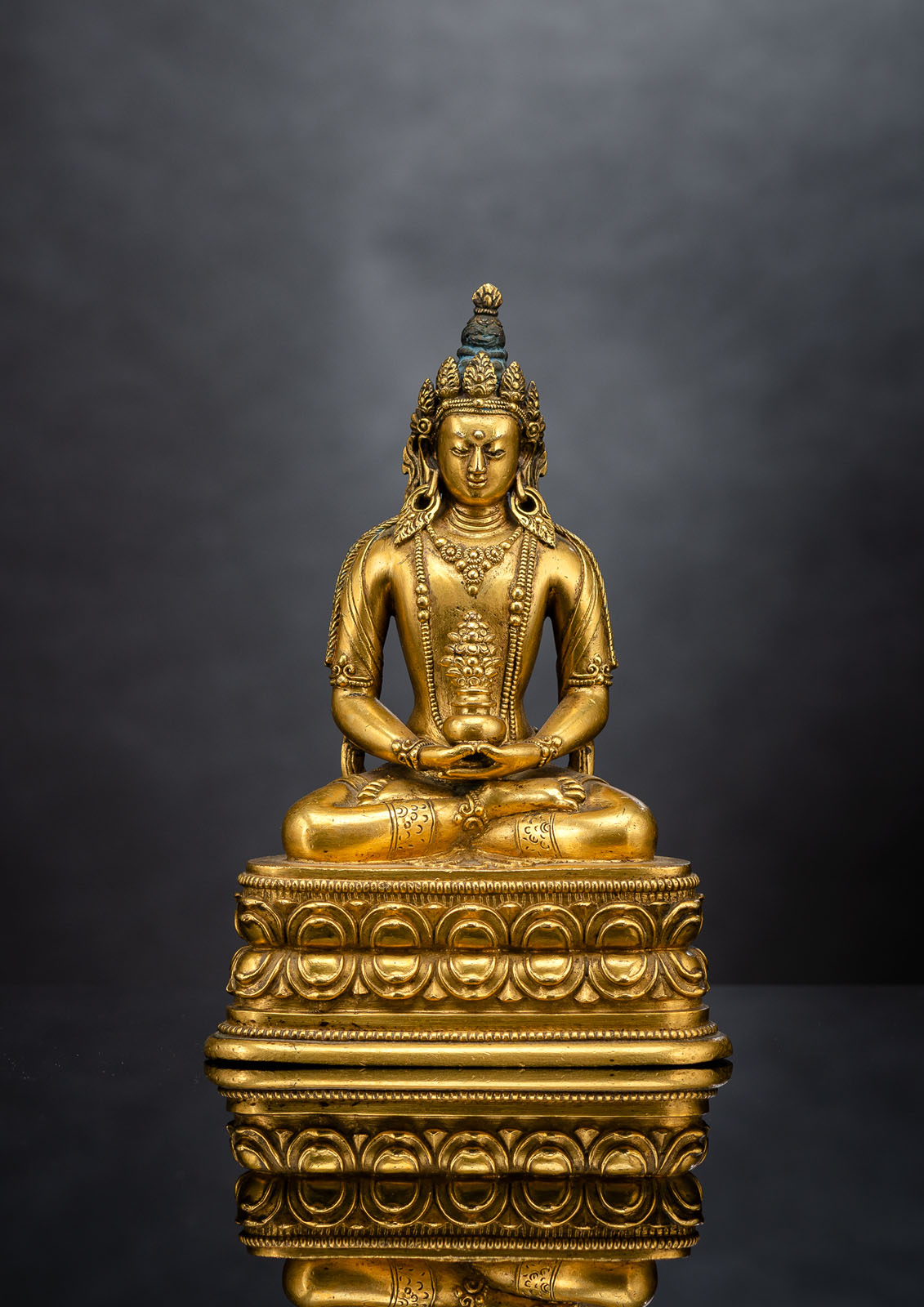 A FINE ZANABAZAR SCHOOL GILT-BRONZE FIGURE OF AMITAYUS