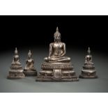 Vier mit Silber beschlagene Figuren des Buddha