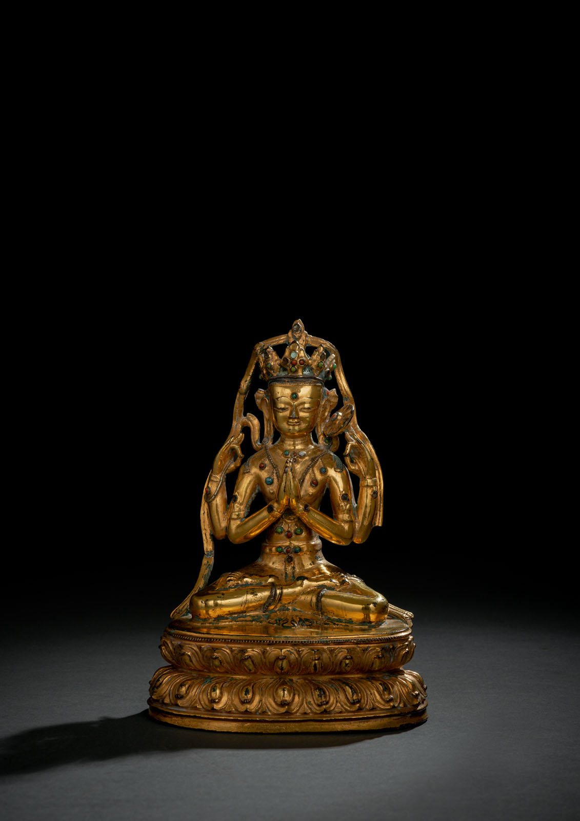 A GILT-BRONZE FIGURE OF SADAKSHARILOKESHVARA