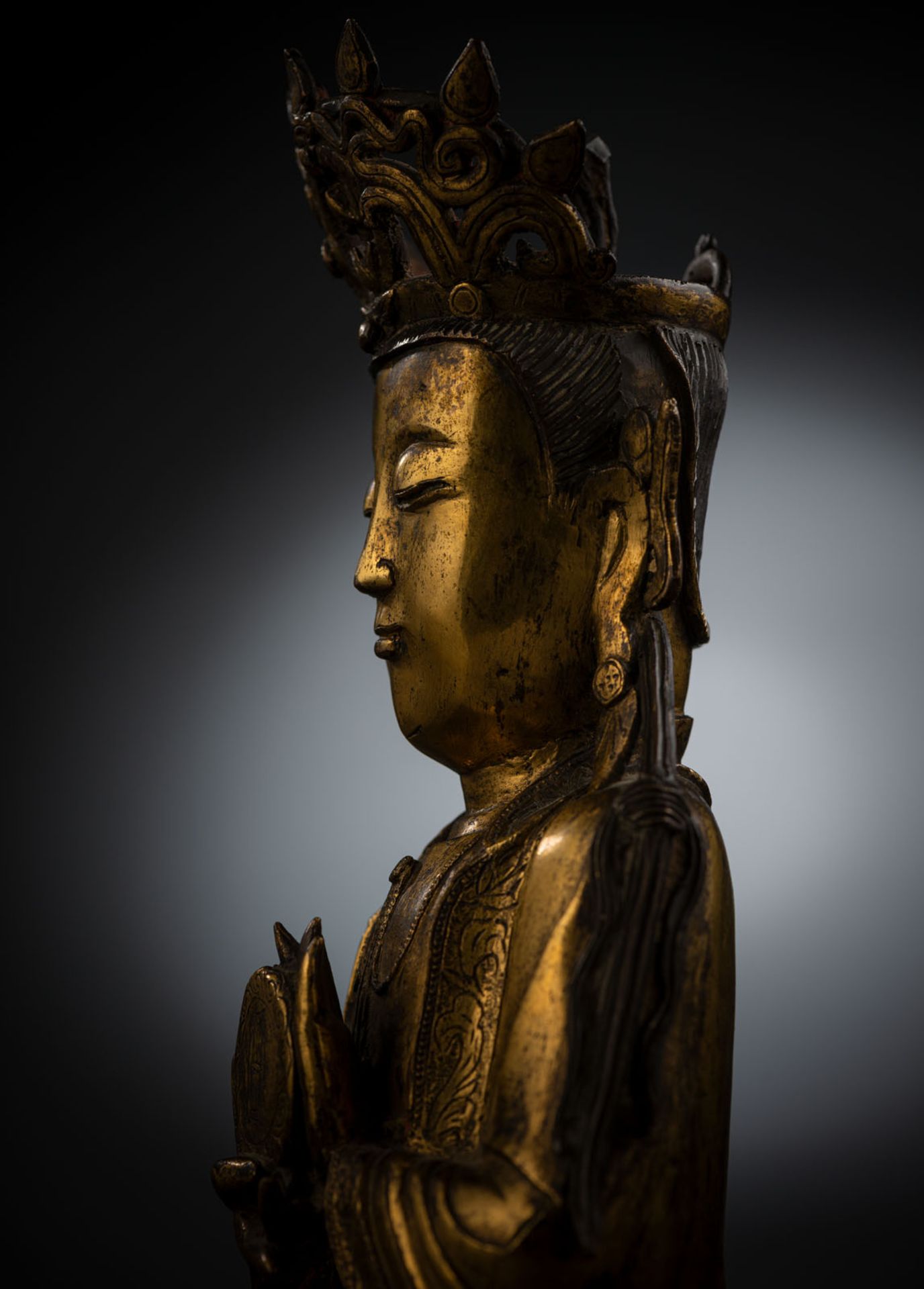 A RARE GILT-BRONZE FIGURE OF SURYABRAHA WITH SUN DISK - Image 4 of 10