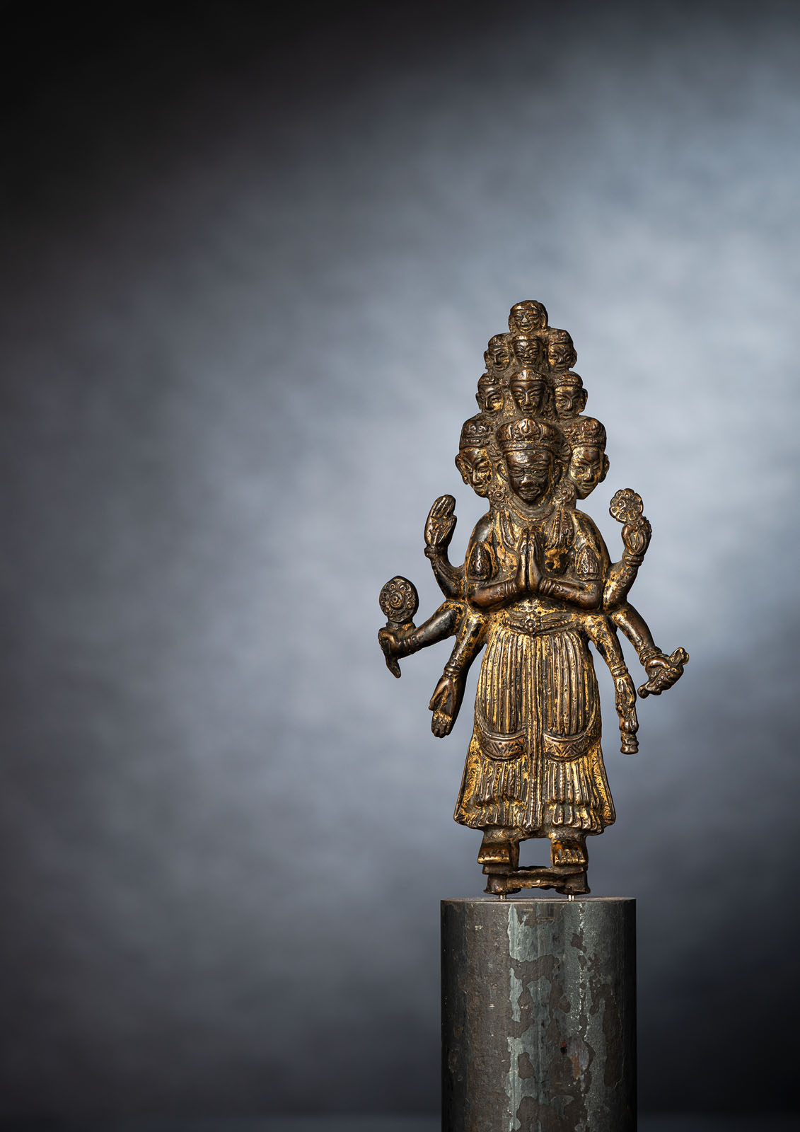 A VERY RARE BRONZE FIGURE OF EKADASHALOKESHVARA