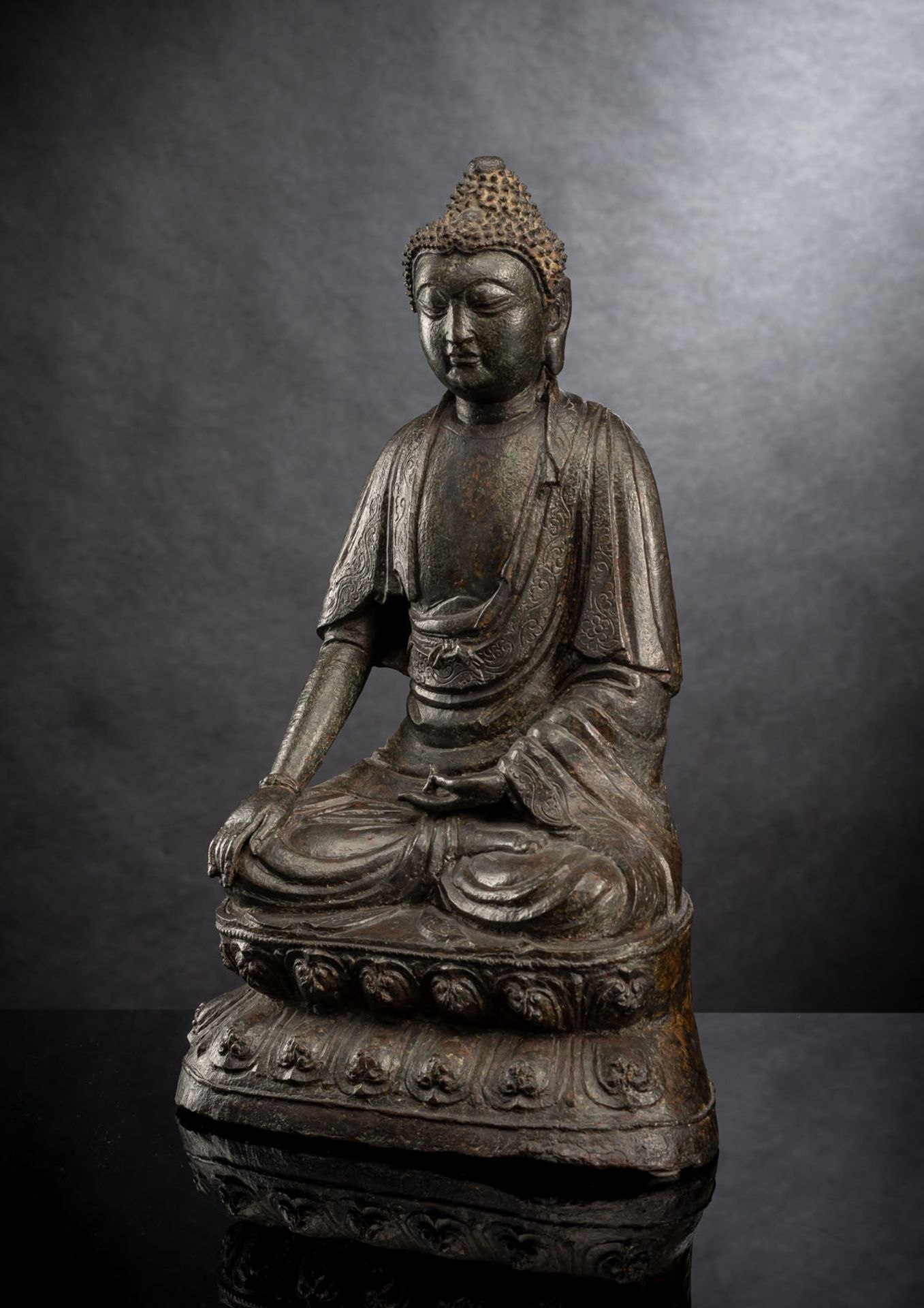 A BRONZE FIGURE OF BUDDHA SHAKYAMUNI