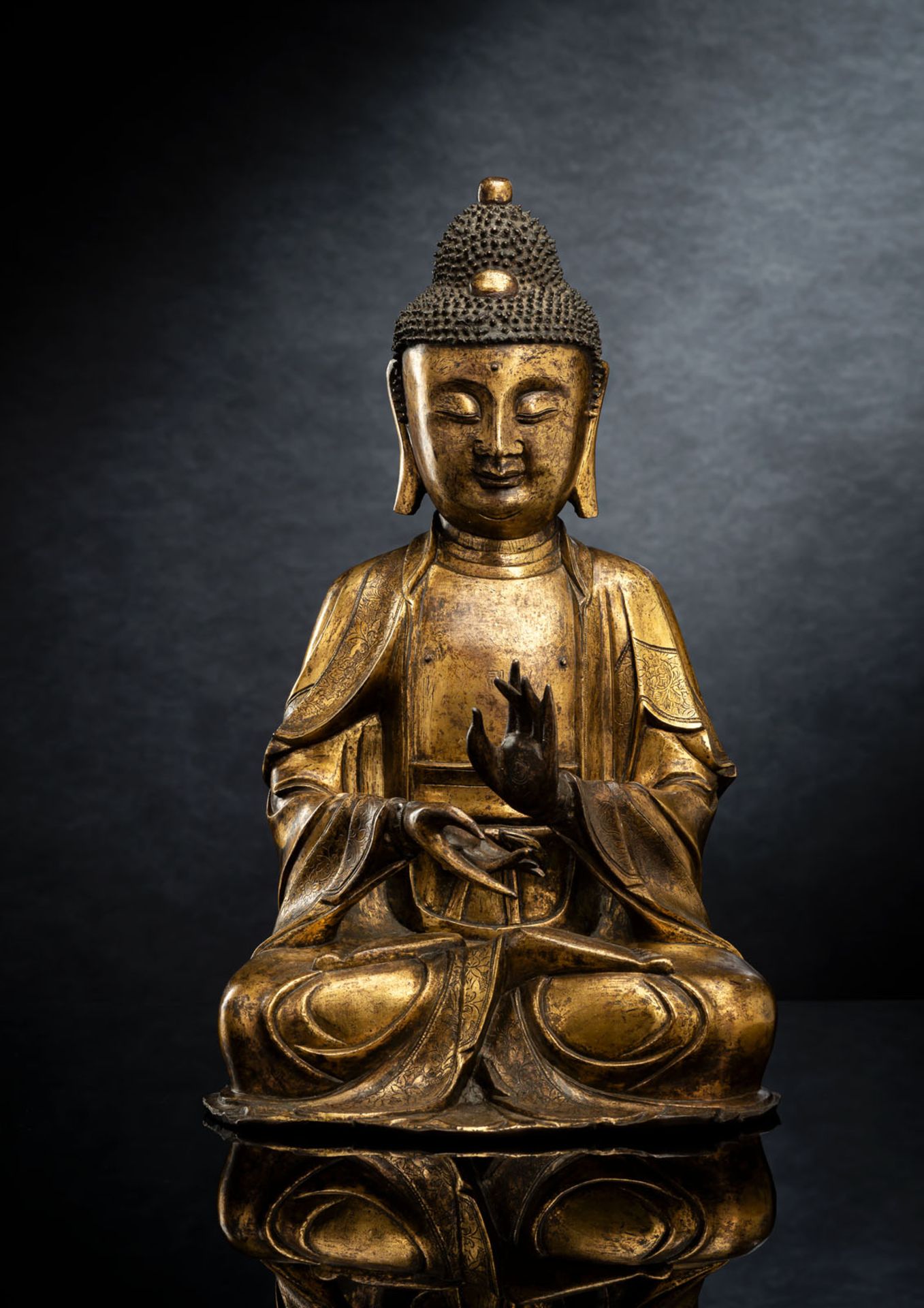 A FINE GILT-BRONZE FIGURE OF BUDDHA SHAKYAMUNI