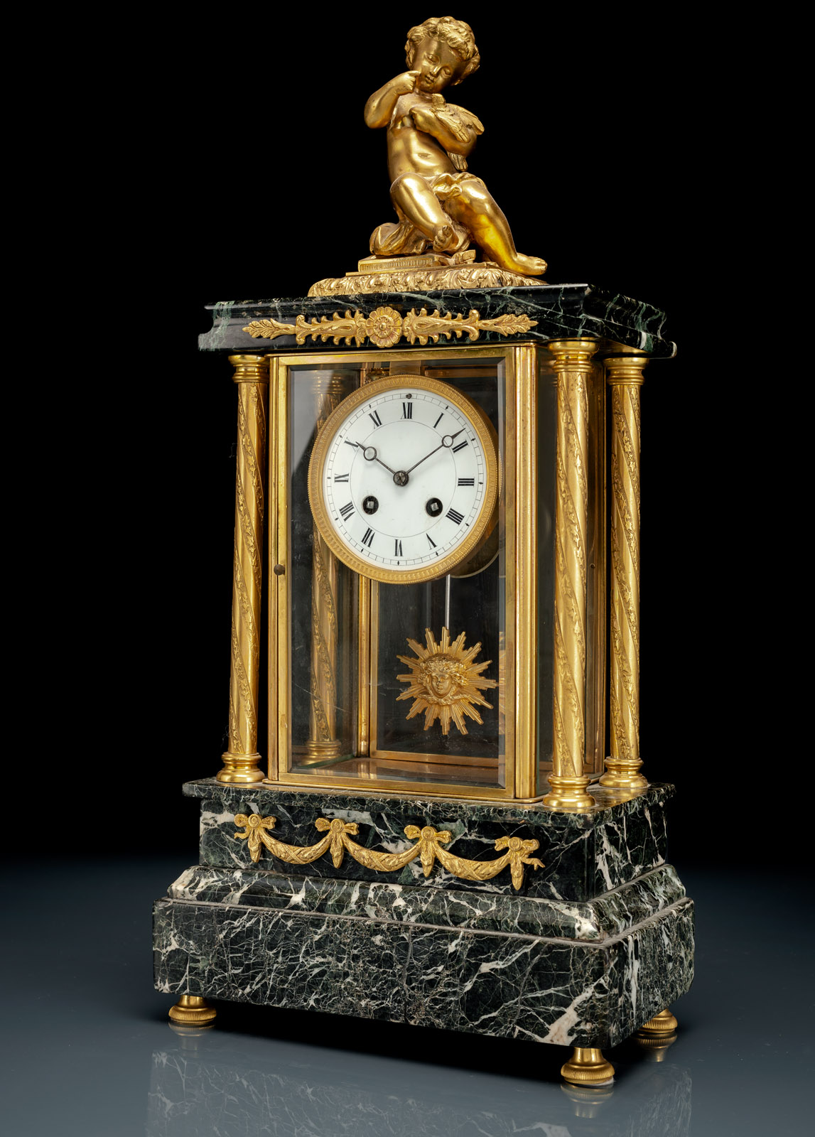 A FRENCH GREEN MARBLE AND BRONZE THREE-PIECE CLOCK GARNITURE - Image 2 of 3