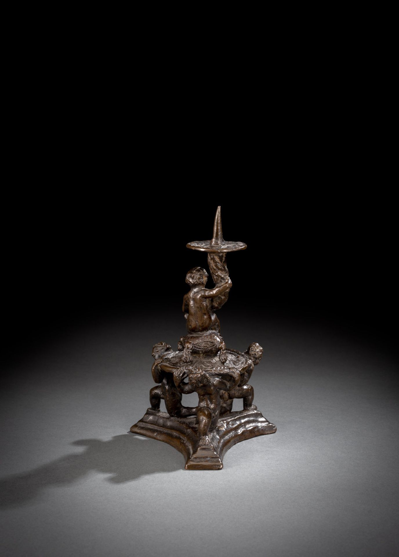 A RENAISSANCE BRONZE CANDLESTICK WITH PUTTI - Image 2 of 2