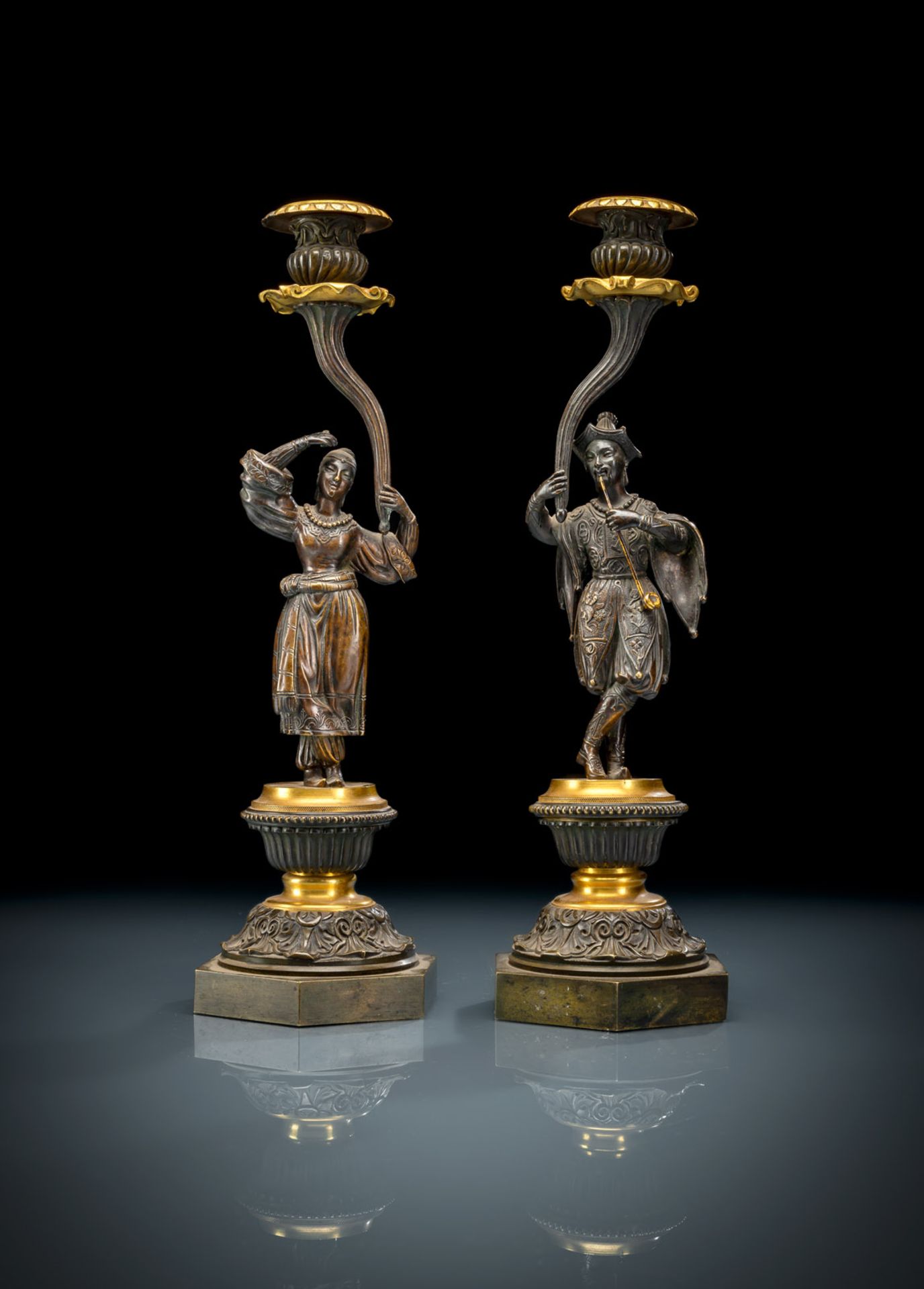 A PAIR OF CHARLES X ORMOLU AND PATINATED BRONZE CANDLESTICKS OF CHINOISE STYLE