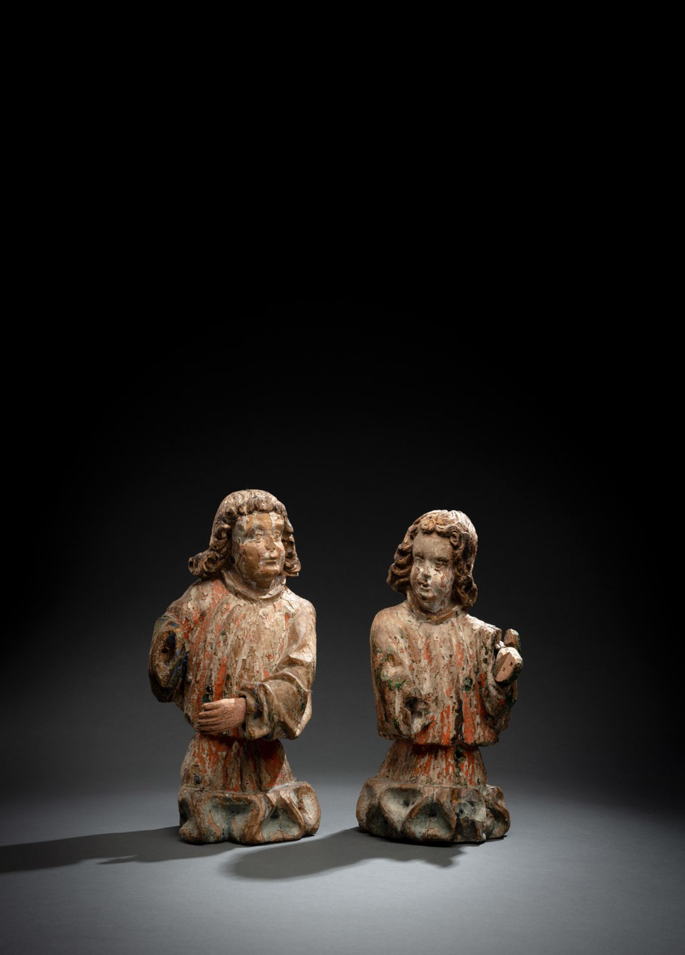 A PAIR OF PROBABLY FRANCONIAN GOTHIC ANGELS ON BANDS OF CLOUDS