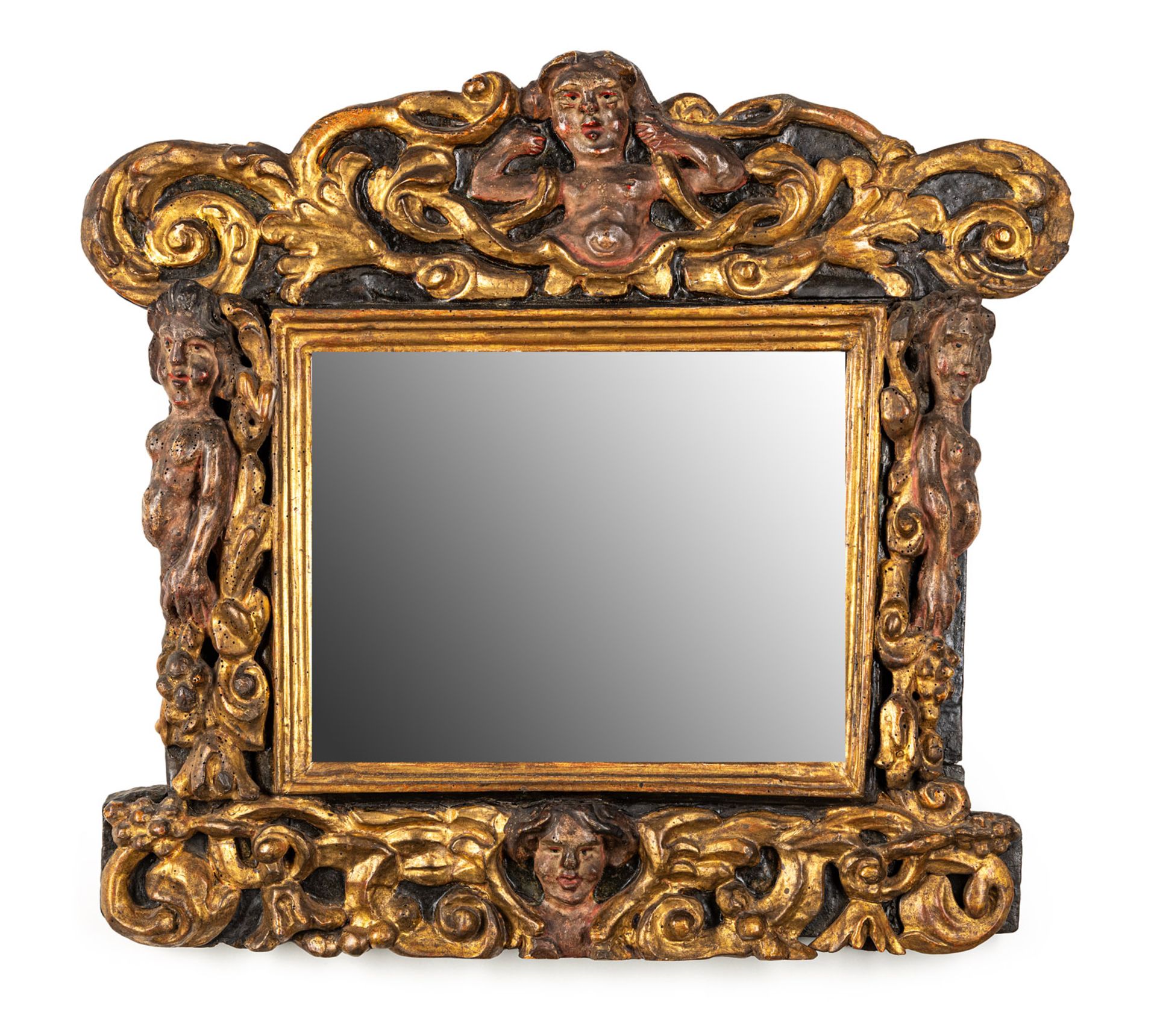 A NORTH ITALIAN POLYCHROME AND GILT CARVED WOOD MIRROR