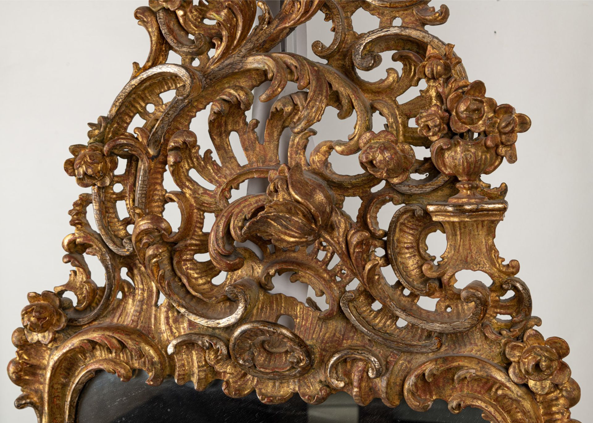 A PAIR OF ELABORATE ROCAILLE FOLIAGE AND FLOWER TOOLED CARVED WOOD WALL MIRRORS - Image 4 of 7