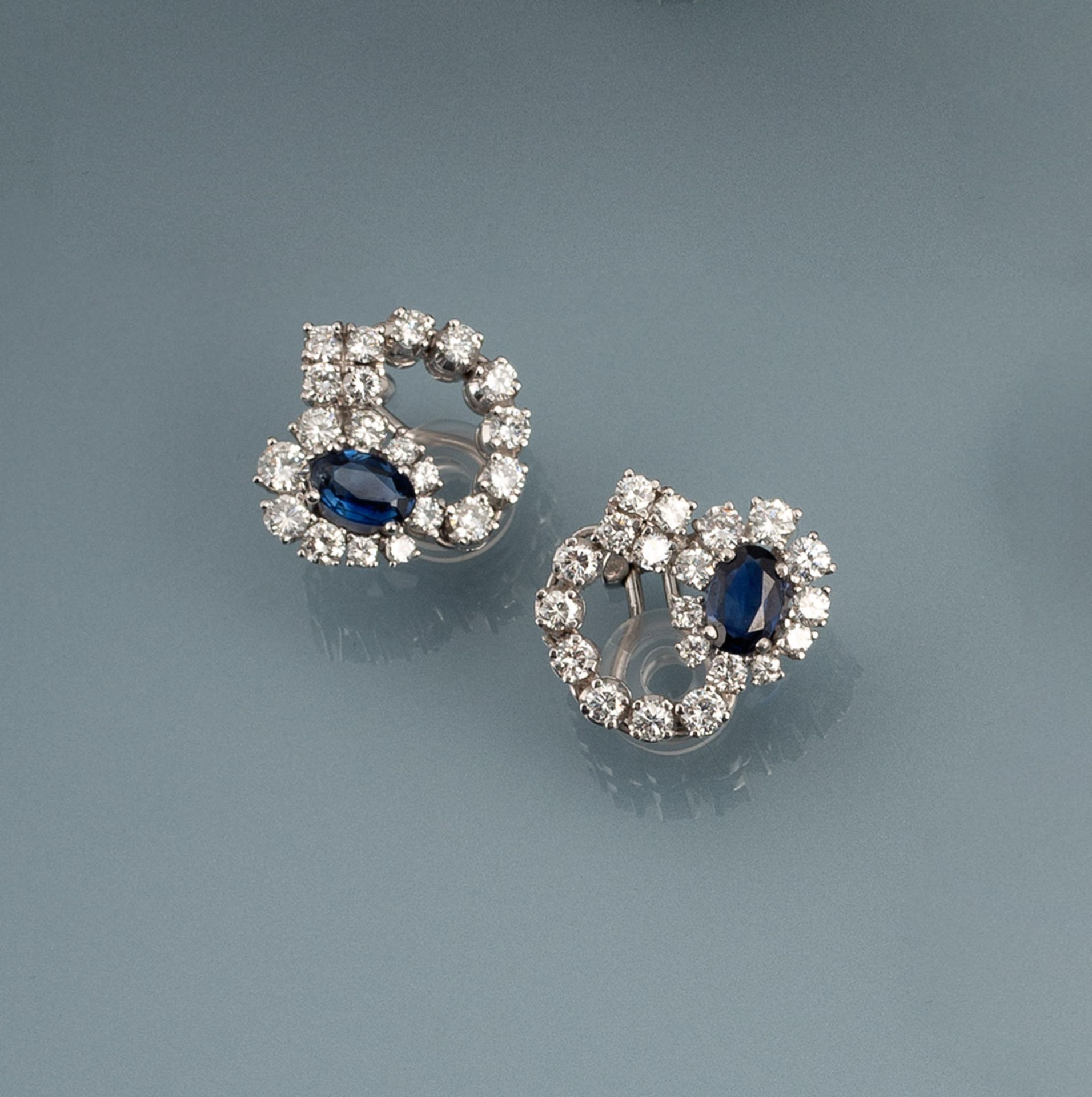 A PAIR OF SAPPHIRE AND DIAMOND EARCLIPS