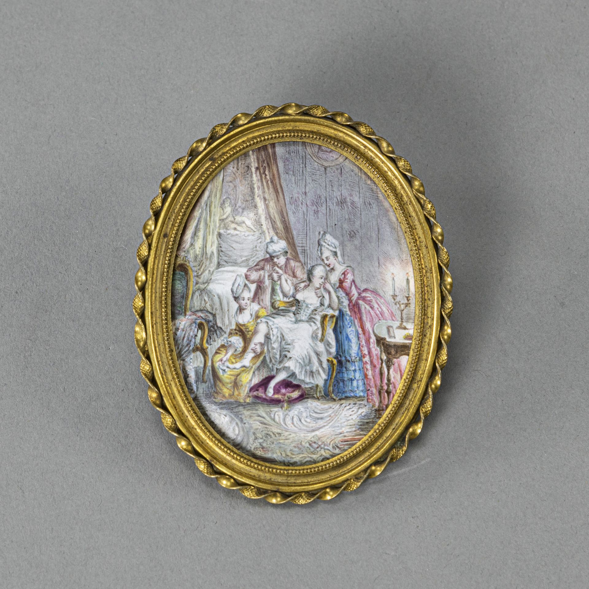 A MINIATURE PAINTING OF AN INTERIOR SCENE
