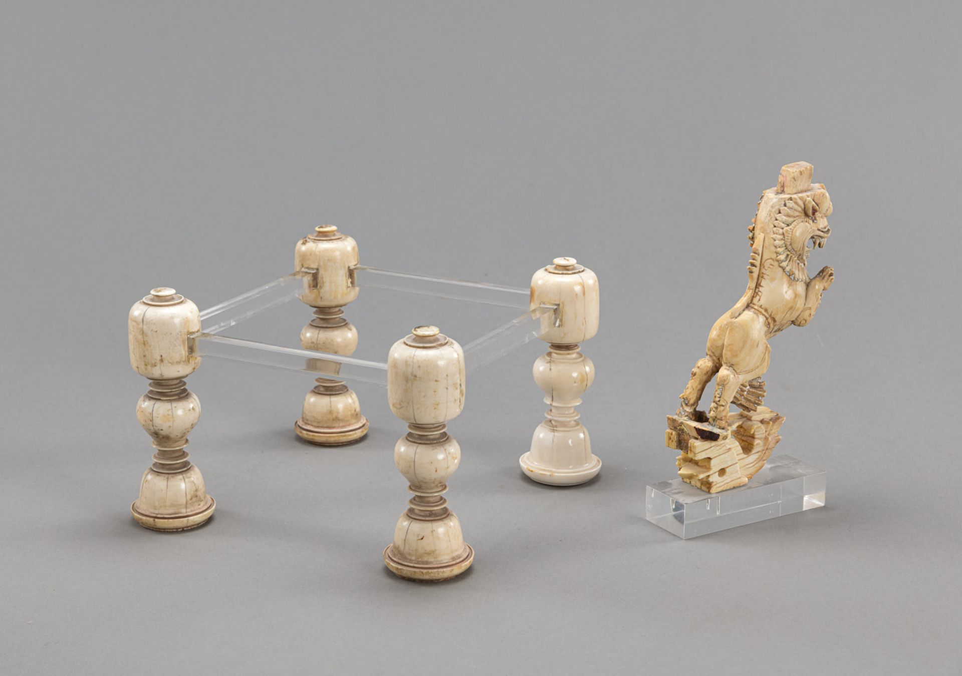 FOUR IVORY THRONE-LEGS AND AN IVORY FIGURE OF A VYALAKA - Image 2 of 2