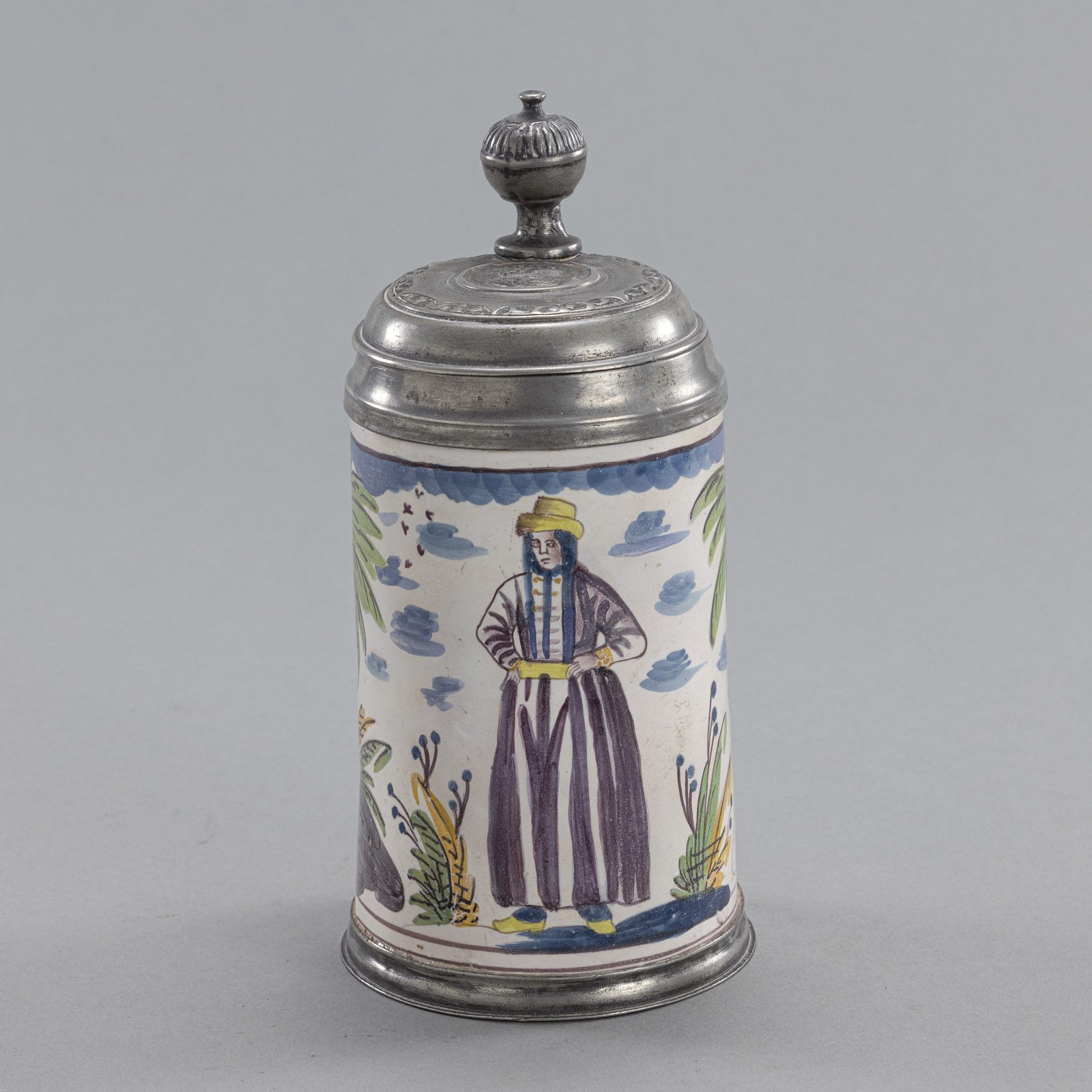 A RHEINSBERG PEWTER MOUNTED FAYENCE TANKARD