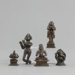 Fünf Figuren aus Bronze mit Darstellungen des Ganesha, Hanuman, eines Heiligen und Krishna