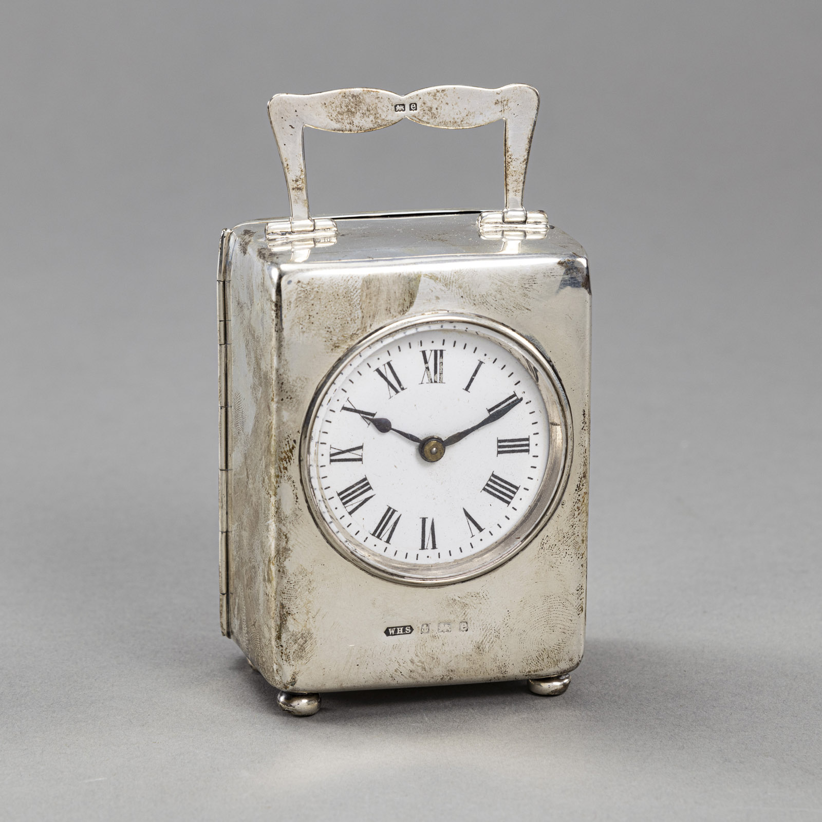 AN ENGLISH TRAVEL ALARM CLOCK