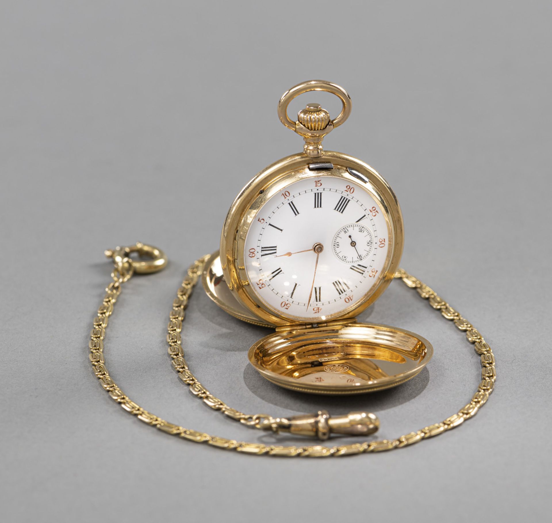 A LADY'S WATCH WITH WATCH CHAIN