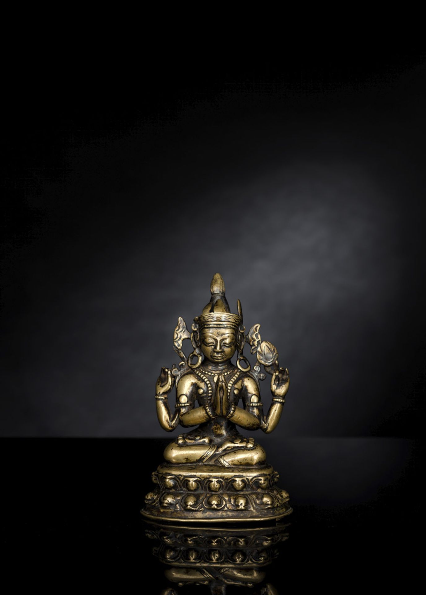 A BRONZE FIGURE OF SADAKSHARILOKESHVARA