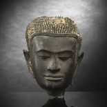Fragment eines Buddha-Kopfes aus Bronze