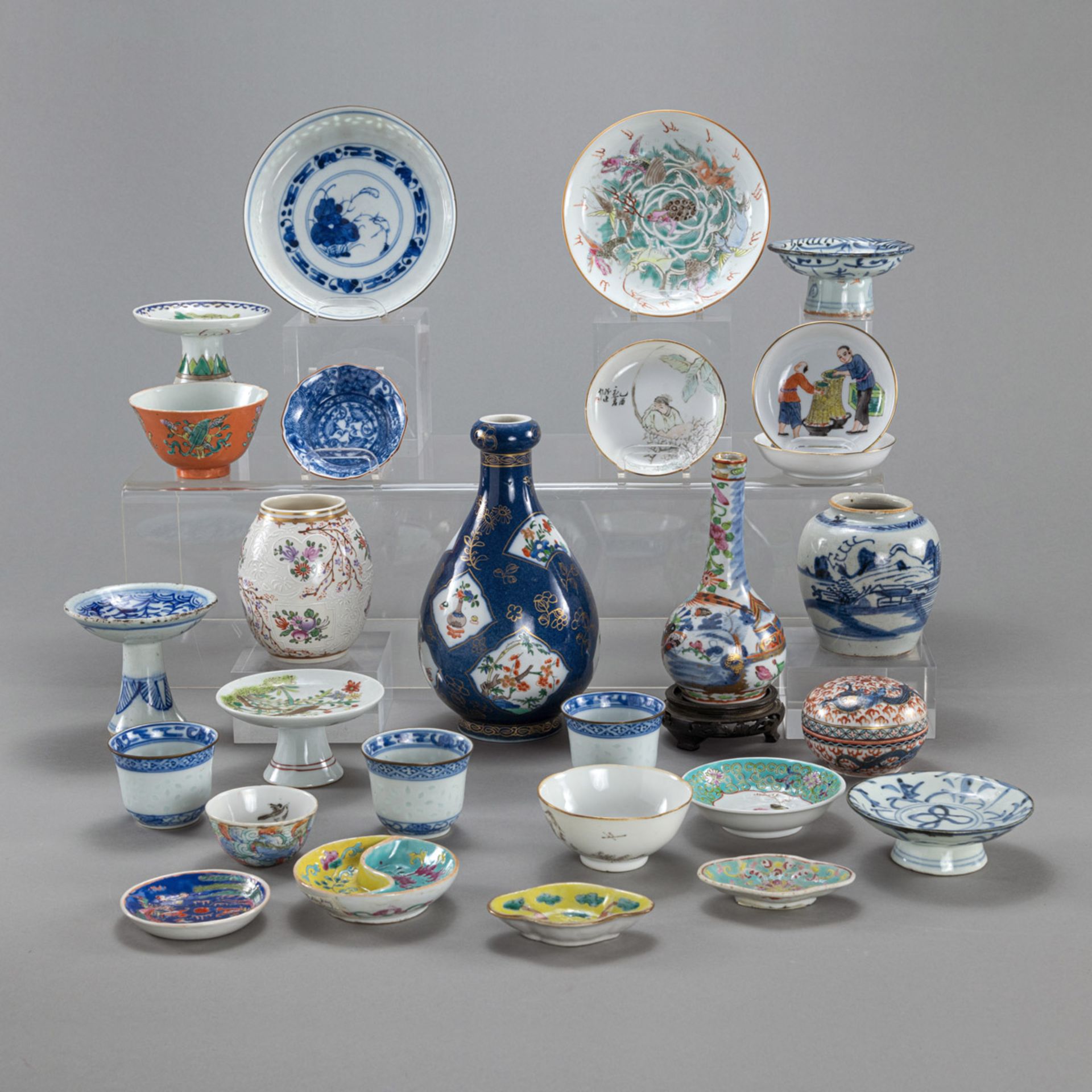 A GROUP OF POLYCHROME PORCELAIN VASES, BOWLS, AND DISHES