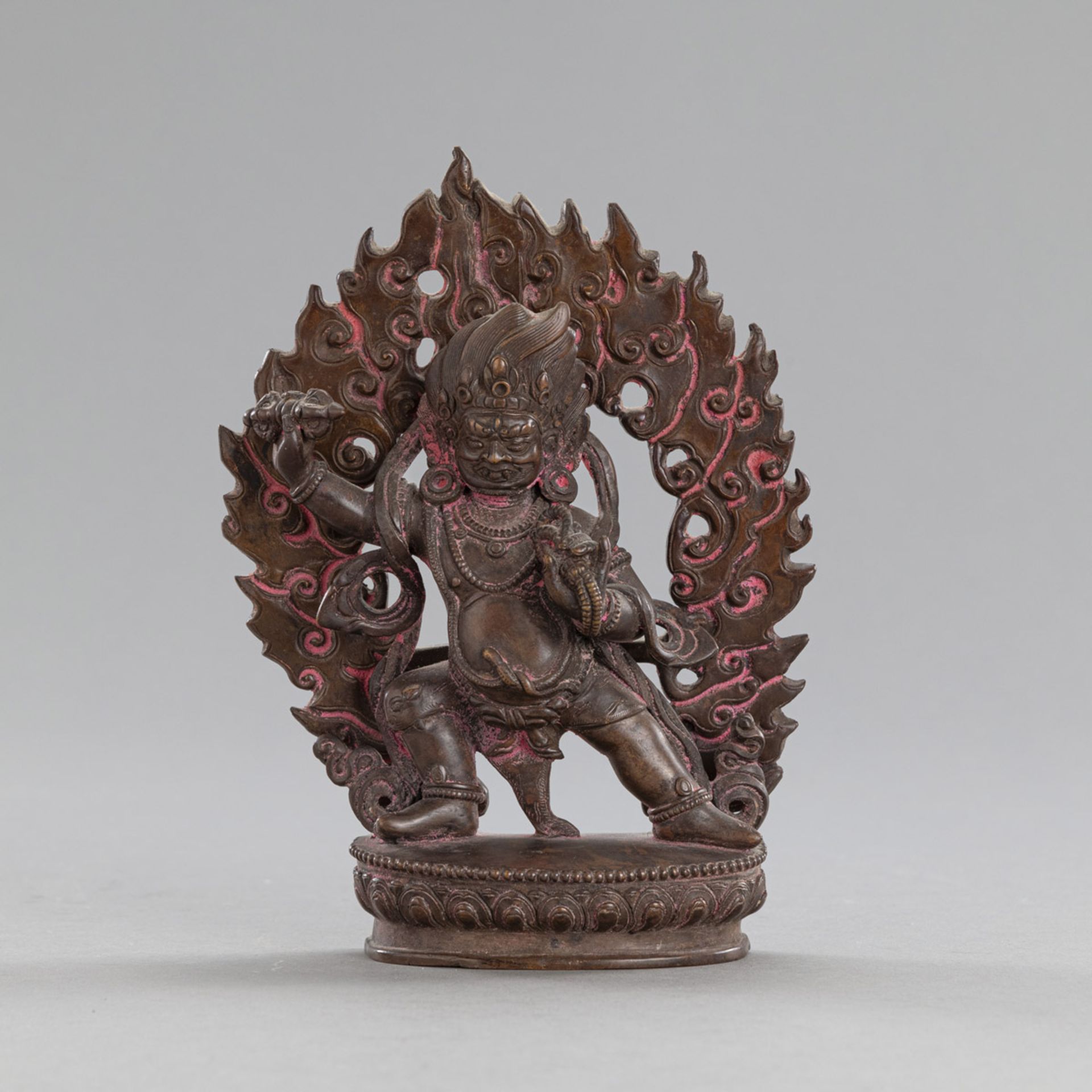 A BRONZE FIGURE OF VAJRAPANI WITH A FLAMING MANDORLA