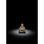 Bronze des Vaishravana mit seinem Mungo auf einem Lotos